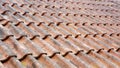 Old weathered roof with red tiles Royalty Free Stock Photo