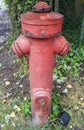 Old weathered rusty red hydrant