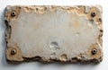 Old weathered stone plaque isolated on white background. Cracked rough textured surface with visible concrete and sand layers. Royalty Free Stock Photo