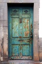 Old weathered timeworn shabby door in Funchal, Madeira