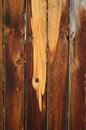 Vertical yellow and brown wood grain pattern old fence Royalty Free Stock Photo