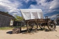 Old weathered wagon with a cloudy sky Royalty Free Stock Photo