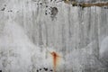 old weathered wall with chipped paint and rust stains abstract background texture Royalty Free Stock Photo