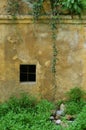 Old weathered wall with window
