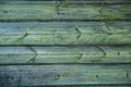 Old weathered wood planks covered with green moss Royalty Free Stock Photo