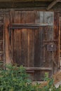 Old and weathered wooden barn door Royalty Free Stock Photo