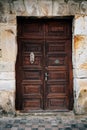 Wooden Door of Historic Spanish Colonial Home Royalty Free Stock Photo