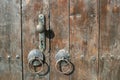 Old weathered wooden door with iron door handle on a traditional bulgarian house Royalty Free Stock Photo