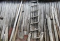 Old weathered wooden ledder in front of barn almost ruined Royalty Free Stock Photo