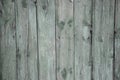 Old weathered wooden planks painted into teal long time ago. texture background Royalty Free Stock Photo