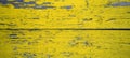 Old weathered wooden planks painted into yellow background Royalty Free Stock Photo