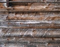 Old weathered wooden wall with horizontal boards and rusty nails in it. Royalty Free Stock Photo