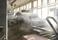 Old weaving looms in an abandoned textile factory in the morning sun Royalty Free Stock Photo