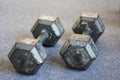 Old weights on carpet floor
