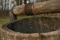 Old well, bucket and string.