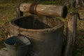 Old well, drum, bucket and string.