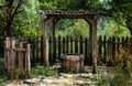 Old well in the garden in the garden Royalty Free Stock Photo