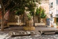 Old well water pump in yard, downtown Alicante, Spain Royalty Free Stock Photo