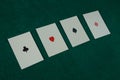 Old west era playing cards on gambling table. Four of a kind, aces Royalty Free Stock Photo