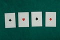 Old west era playing cards on gambling table. Four of a kind, aces Royalty Free Stock Photo