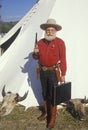 Old West gunslinger drawing guns during historical reenactment, CA Royalty Free Stock Photo