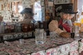 Dollar bills cover an old west saloon