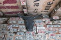 Dollar bills cover the walls in an old west saloon