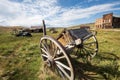 Vintage old west abandoned buildings and wagon, waho in ghost town Bodie, California Royalty Free Stock Photo