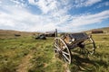 Vintage old west abandoned buildings and wagon in ghost town Bodie, California Royalty Free Stock Photo