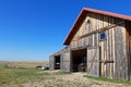 Old western barn buildings in the great plains of Dakota Royalty Free Stock Photo