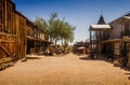 Old Western Goldfield Ghost Town square with huge cactus and saloon, photo taken during the sunny day Royalty Free Stock Photo