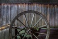 The old wheel of a cart in barn Royalty Free Stock Photo