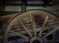 The old wheel of a cart in barn Royalty Free Stock Photo