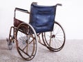 Old wheelchair and damaged, disabled car, Bad health