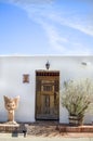 Old white adobe building