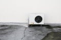 Old white air conditioner compressor. rust metal on floor Royalty Free Stock Photo