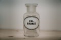 An old white apothecary jar, which used to be used for medicines Royalty Free Stock Photo