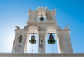 Old white bell tower in Santorini