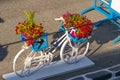 White bike decorated with flowers