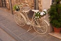 An old white bike on the street Royalty Free Stock Photo
