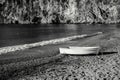 An Old White Boat On A Beach