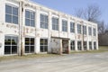 Old white brick factory building Royalty Free Stock Photo