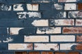 Old white brick wall shaded blue paint Royalty Free Stock Photo