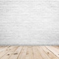 Old white brick wall and wood floor background and texture with copy space Royalty Free Stock Photo