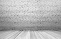 Old white brick wall and wooden floor Royalty Free Stock Photo
