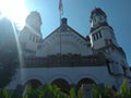 An old white building that stands majestically in the `Lawang Sewu` tour in the city of Semarang with a very thick and green banya