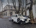 Old white Car abandoned in a street of Colonia del Sacramento, Uruguay Royalty Free Stock Photo