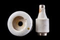 Old white ceramic electric fuse. Electrical surge protection