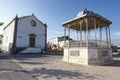Old white church and bandstand in Palmela, Portugal