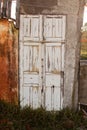 Old white colored door in abandoned house Royalty Free Stock Photo